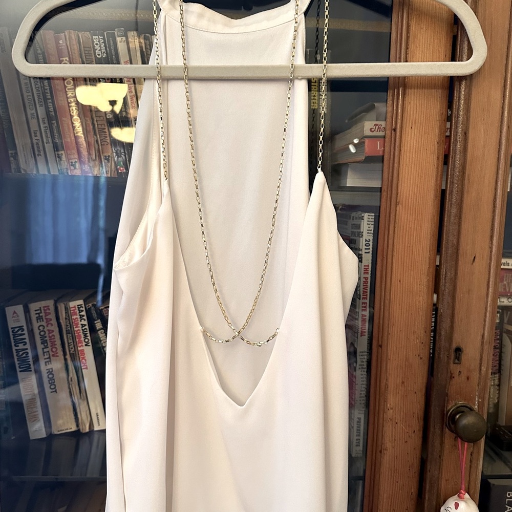 White with gold blouse